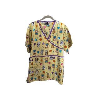 ￼ TD scrubs, women’s yellow dog print scrub top size large